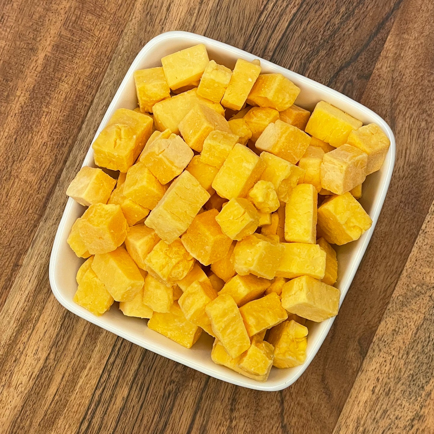 Freeze-Dried Cheese Dog Treats in a bowl