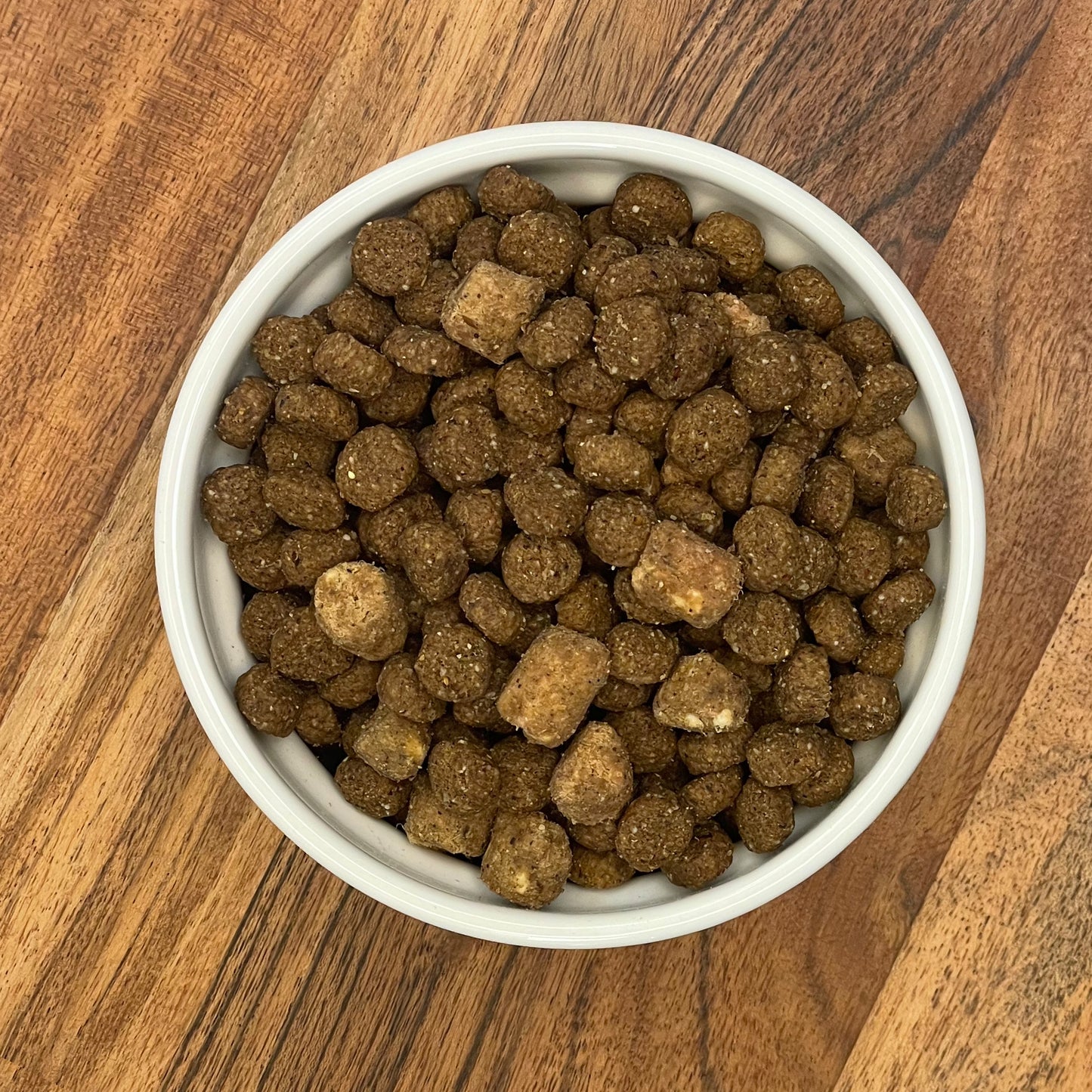 Perfect Balance Pork Dry Dog Food with Freeze-Dried Beef Bites in a bowl