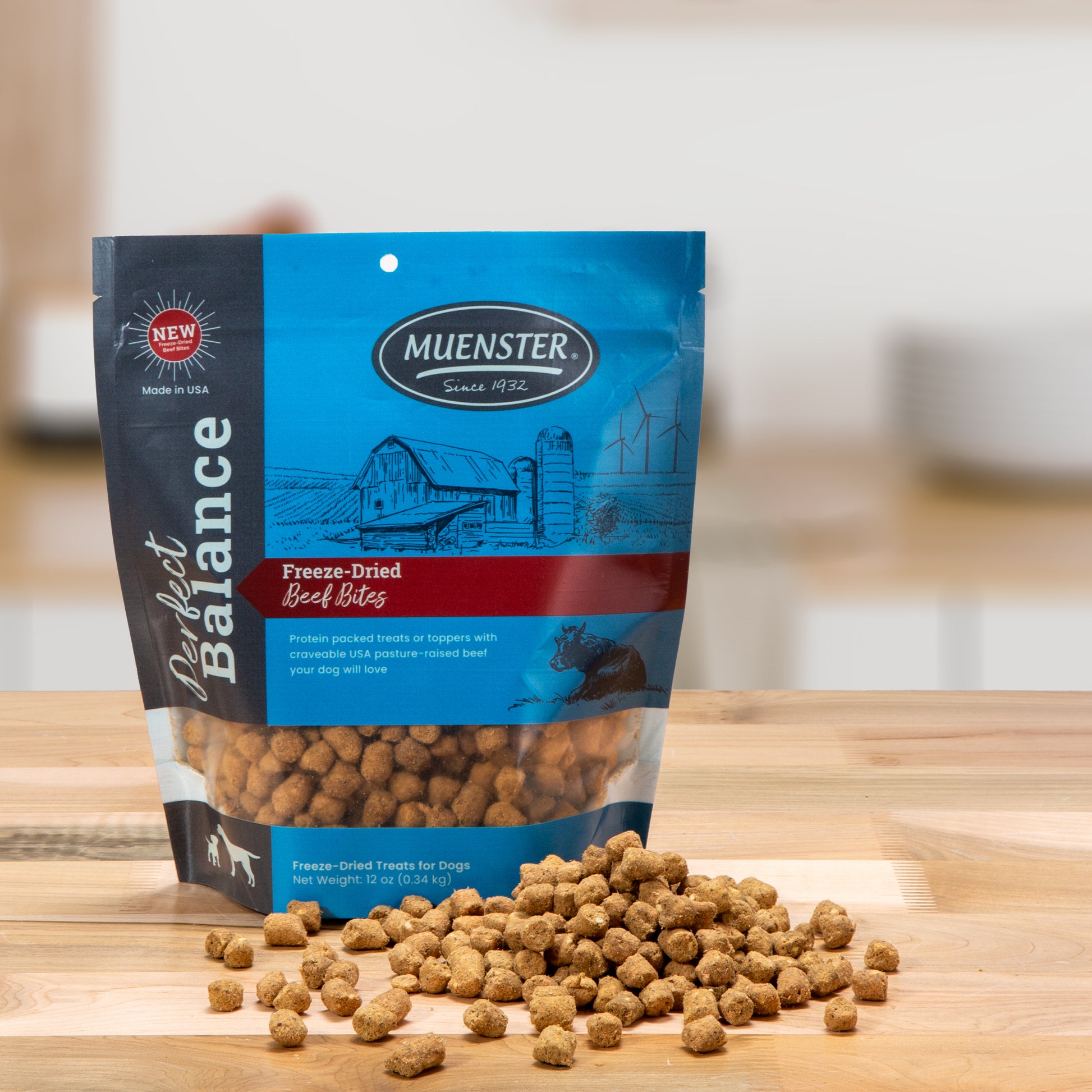 Muenster Perfect Balance Freeze-Dried beef bites, complete & balanced food for dogs, bag with pieces outside of it