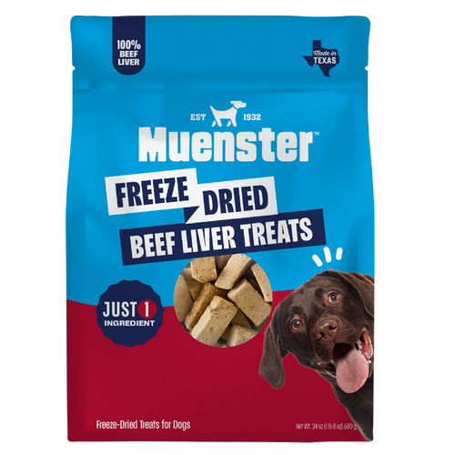 A bag of Muenster Freeze Dried Beef Liver Treats for dogs, featuring a blue and red package design with a photo of a chocolate Labrador on the front.