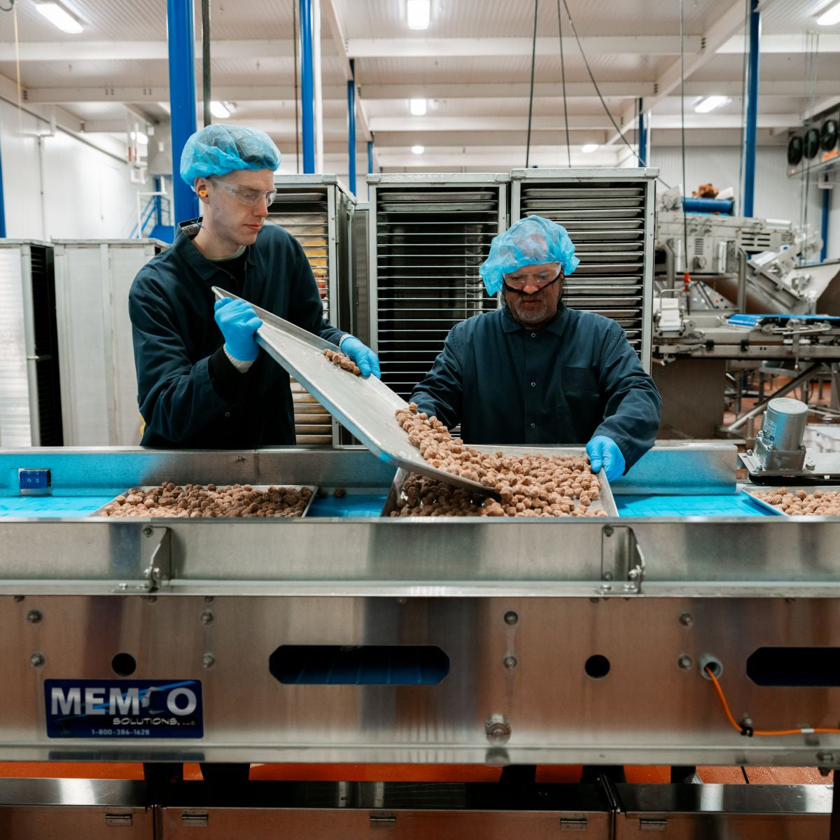 Muenster Pet team members making freeze-dried meatball treats in Denton, Texas