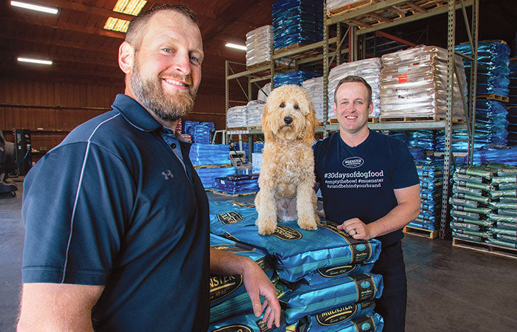 Mitch and Chad Felderhoff with their grandfather at Muenster Milling Company